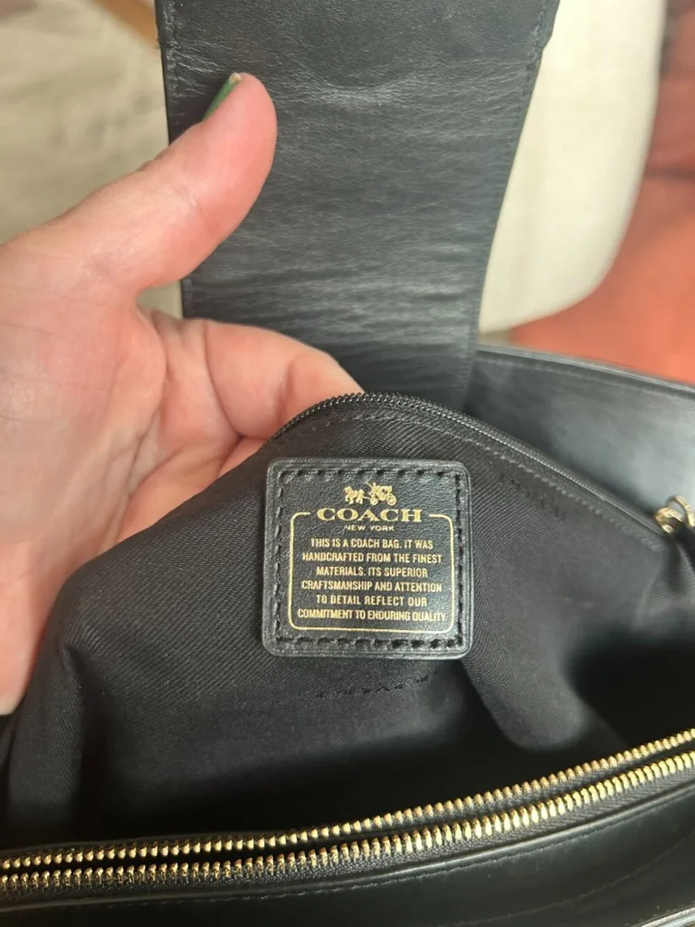 Coach Swagger Carryall in black leather with snakeskin-embossed side panel
